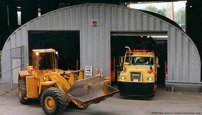 construction garage shown with a maintenance vehicle parked inside 